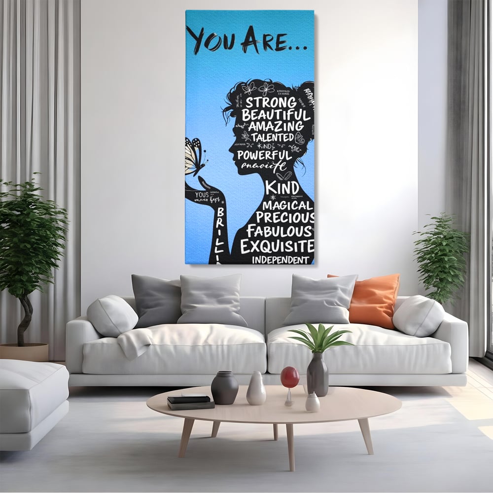 Tablou canvas cu tablou motivational cu portret de femeie si cuvinte, fara rama, pe sasiu de lemn, pe perete intr-un living